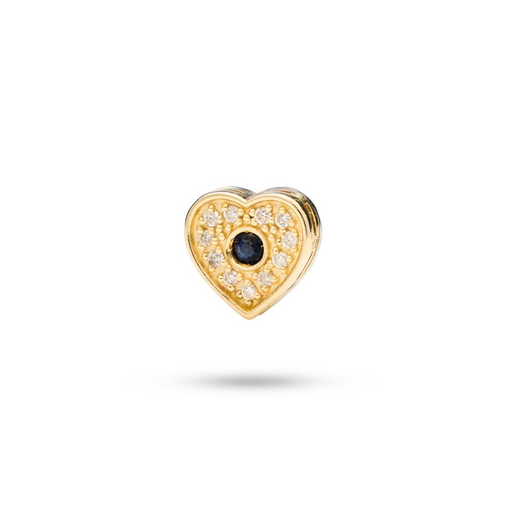 Heart-shaped dog charm with black and white diamonds, symbolizing love and devotion, crafted in 14k gold.