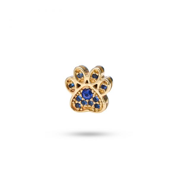 14k gold paw print dog charm adorned with 11 black diamonds, symbolizing cherished moments with your pet.