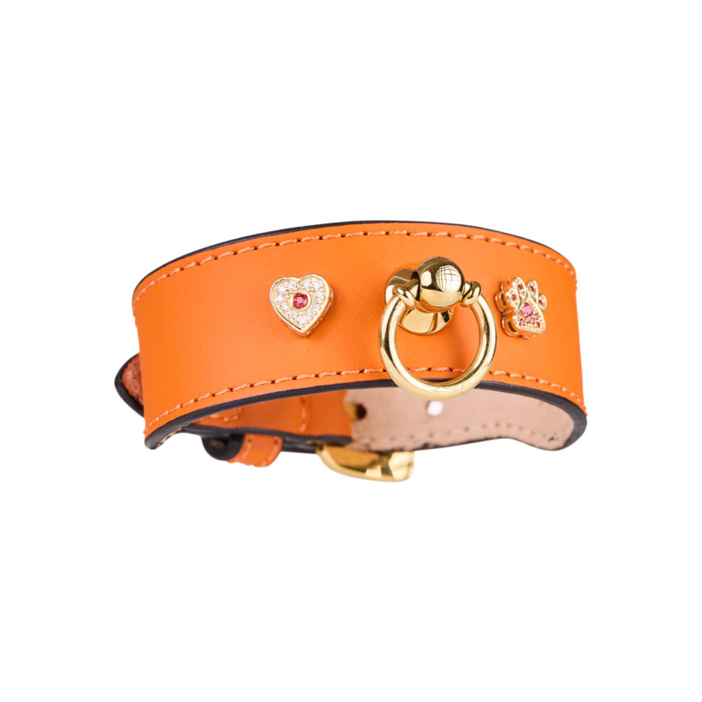 IImage of MAYADORO Orange Leather Bracelet with Two Charms: Paw and Heart in 14k Gold with Diamonds and Orange Sapphires.