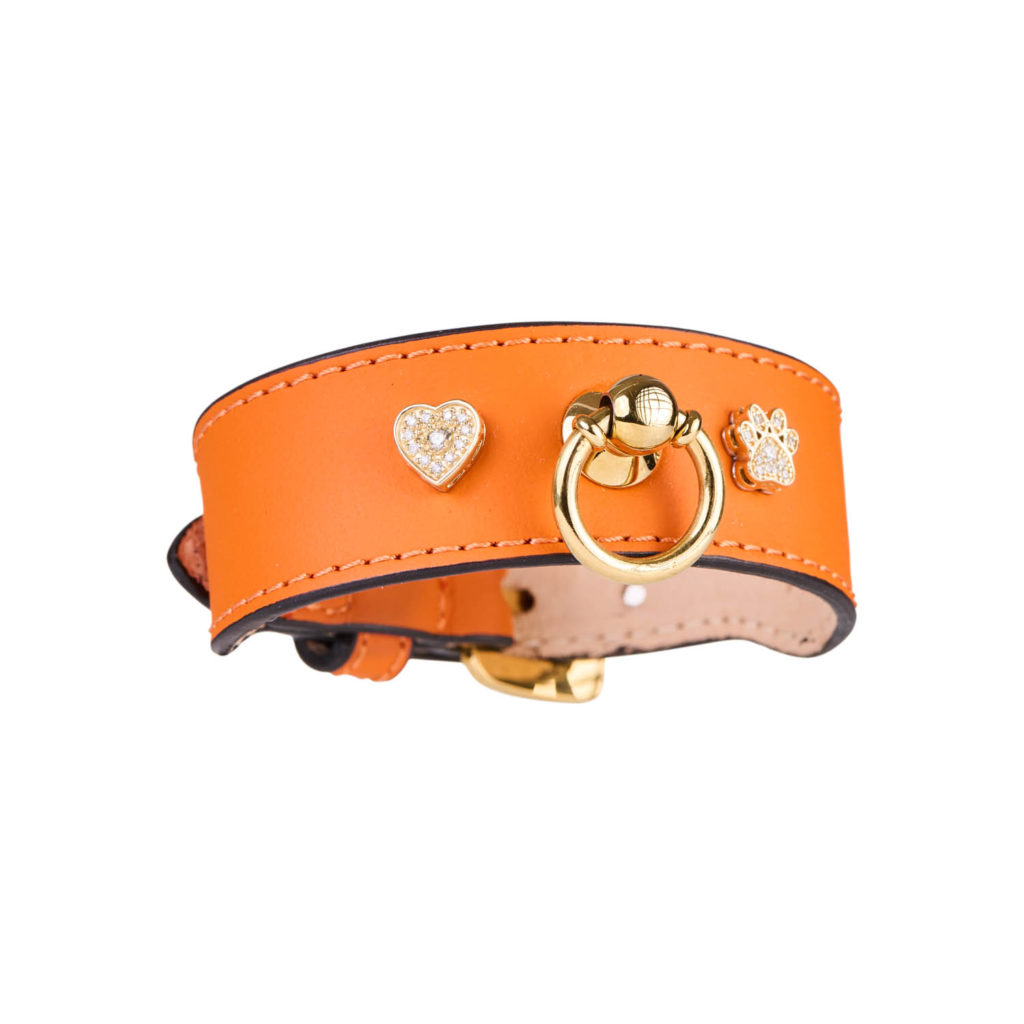 Image of MAYADORO Orange Leather Bracelet with Two Charms: Paw and Heart in 14k Gold with Diamonds.