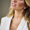 Paw Amour Earrings in 14k Gold with Diamonds — worn by a devoted dog lover, MAYADORO
