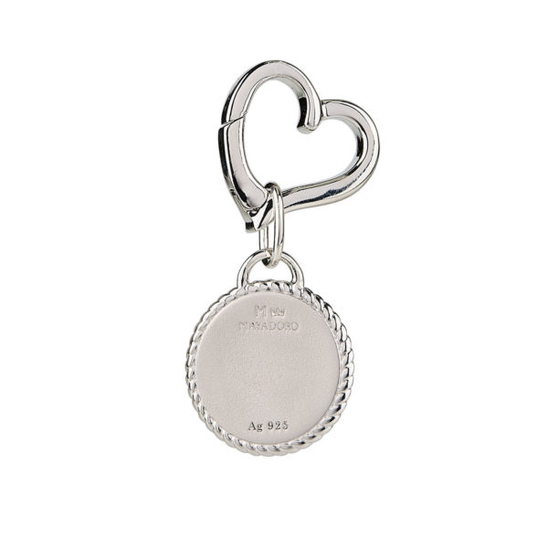 Image showcasing the backside of the MAYADORO 925 Sterling Silver Dog ID Tag, featuring space for engraving and adorned with authentic diamonds.