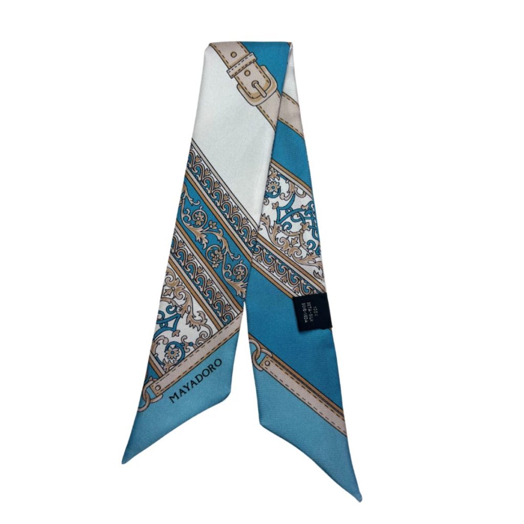 Image showcasing the luxurious MAYADORO Dog Twilly in vibrant turquoise silk.
