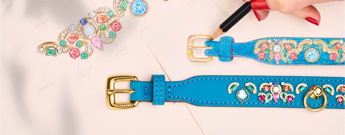 Artisan handcrafting a one-of-a-kind MAYADORO dog collar with pavé-set gemstones.