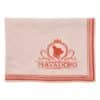Folded MAYADORO cashmere blanket in orange – made for small dogs with style and sensitivity