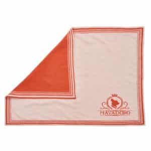 MAYADORO orange cashmere dog blanket, unfolded, with turned corner revealing both sides