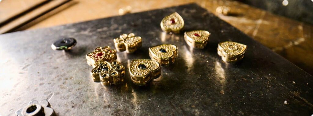 Italian atelier table with MAYADORO motifs in 14k gold set with diamonds, prepared for bracelet and collar design