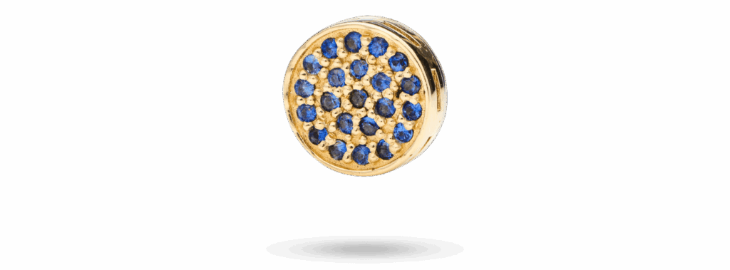 Circle motif in 14k gold with pavé-set blue sapphires